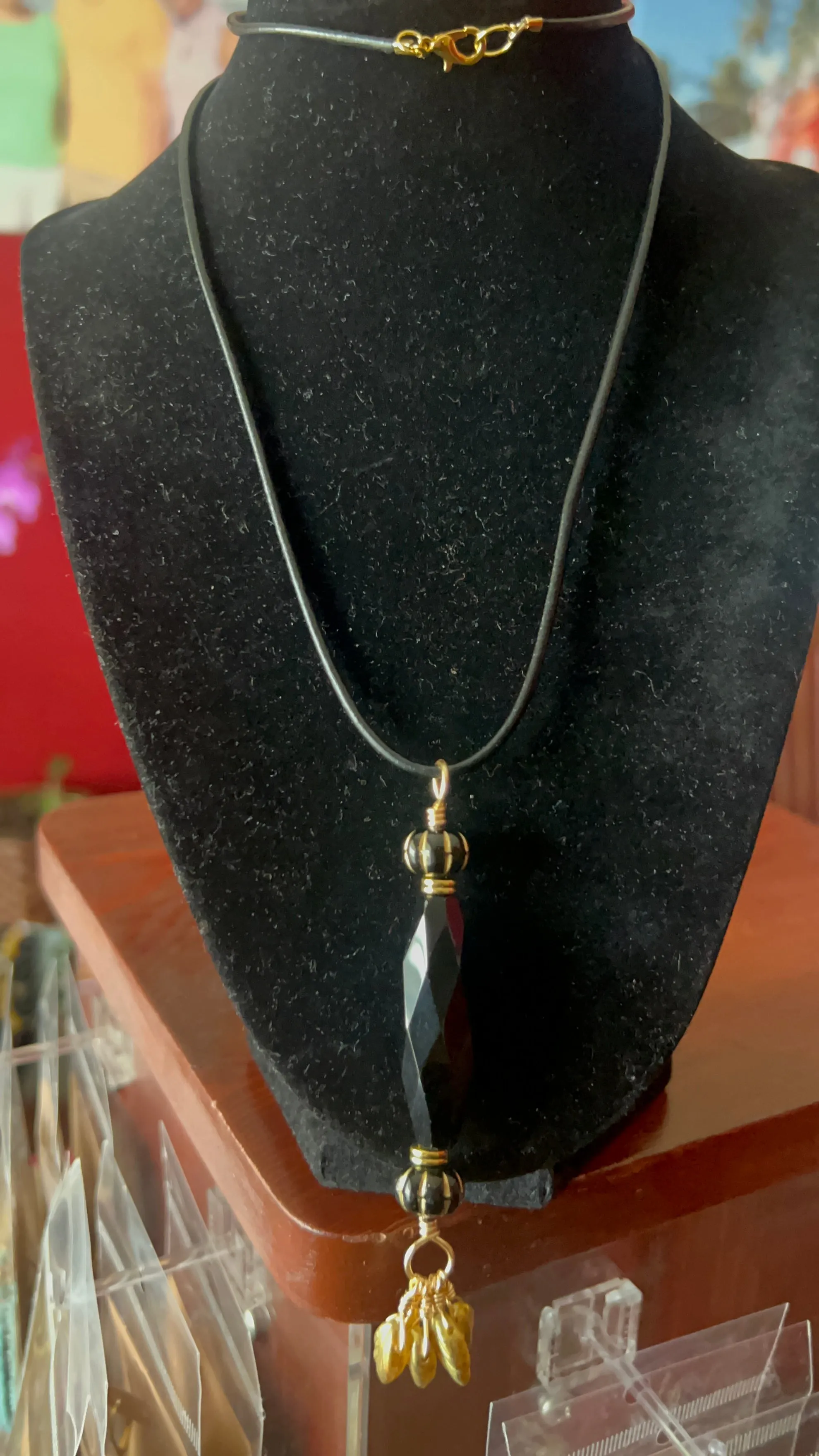 Black Crystal with Gold leaves Pendant on black leather 25 inch necklace  - pendant is 4 inches